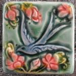 Swallow in a cherry blossom tile (face left) by Verdant tile